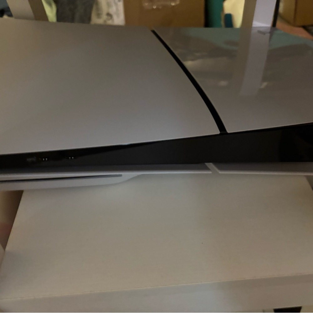 Sleek White and Black Gaming Console